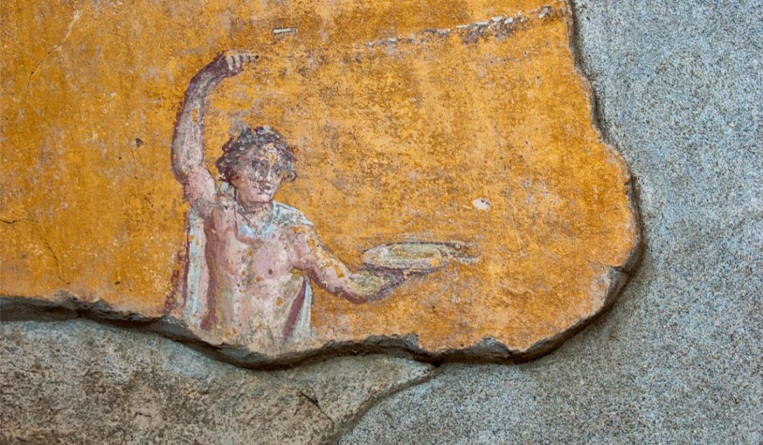 Descubren la representación más antigua de una pizza en las paredes de Pompeya -0